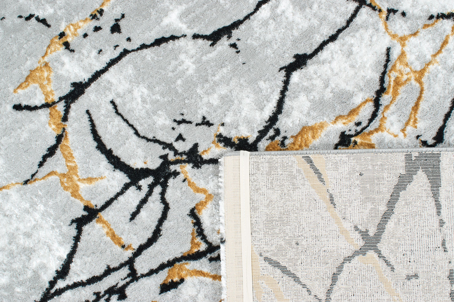 LIPARIS - Tapis Marbré noir dorée à poils ras